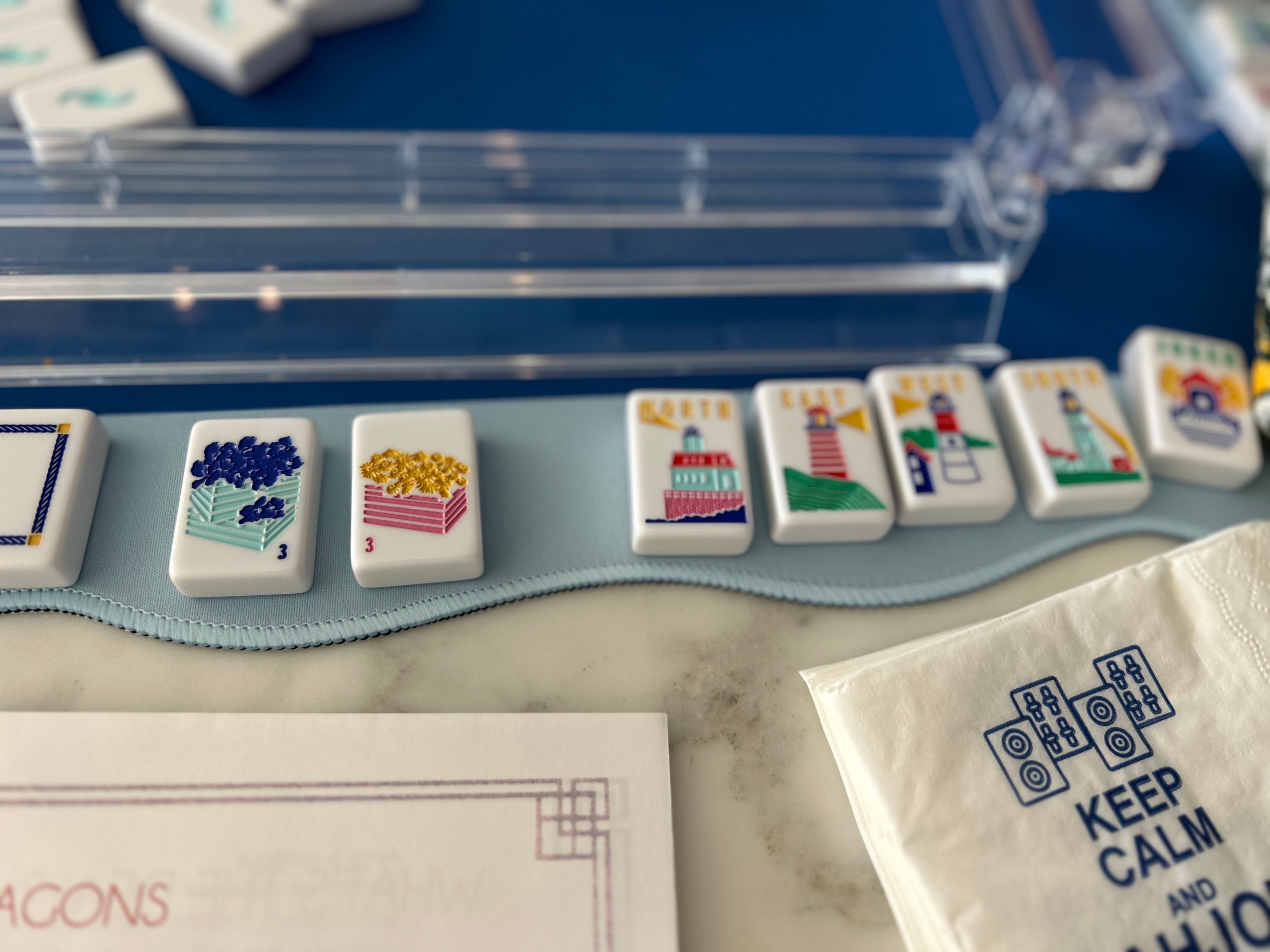 A beautifully arranged Mahjong tile collection on display